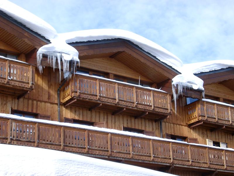 a snow covered winter mountain cabin, france