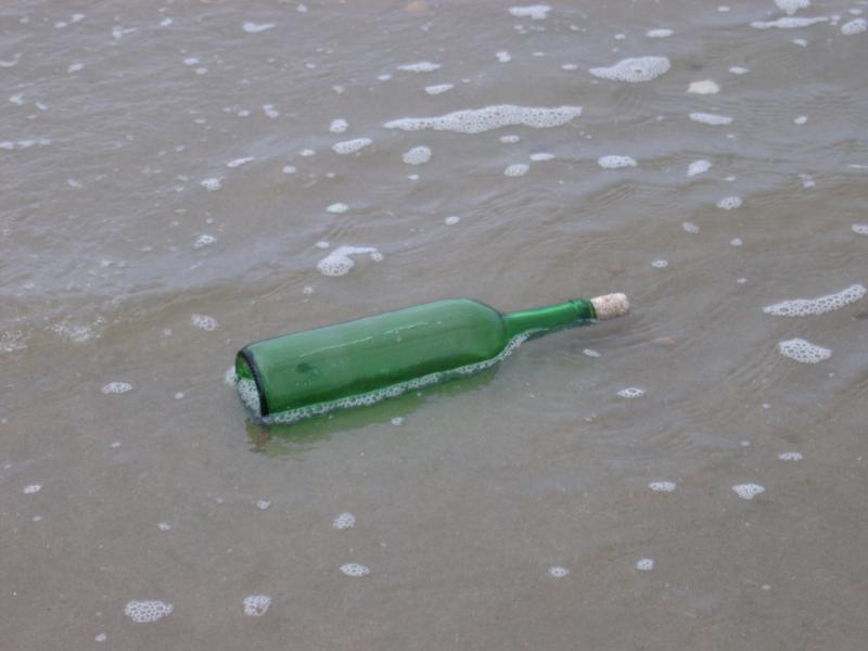 message in a bottle: concept of communications and luck in contacting someone