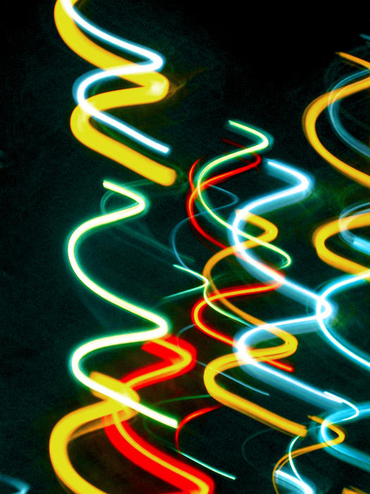 bright glowing corkscrew pattern, spiral light trails in vivid colours