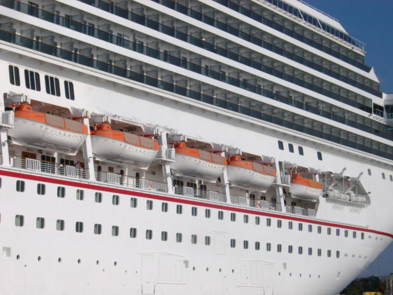 side of a large cruise ship on the caribbean