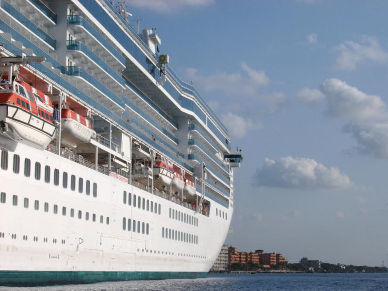 side of a large cruise ship on the caribbean