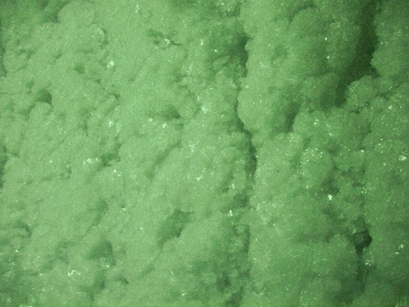 green coloured ice frosting slushy drink