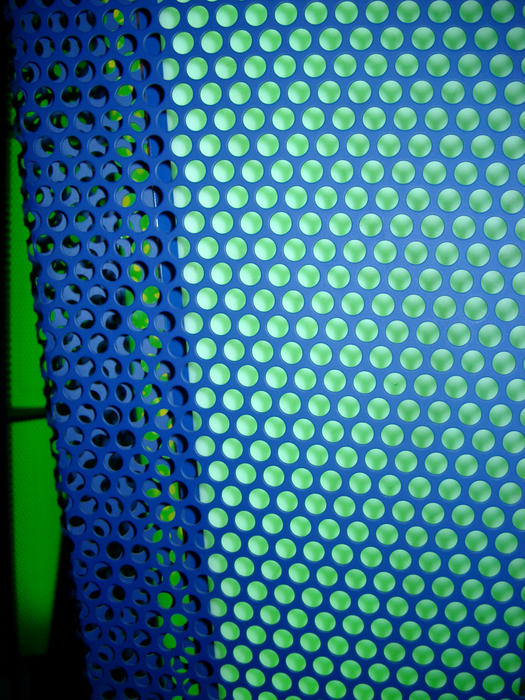 metal mesh with breen background illumination