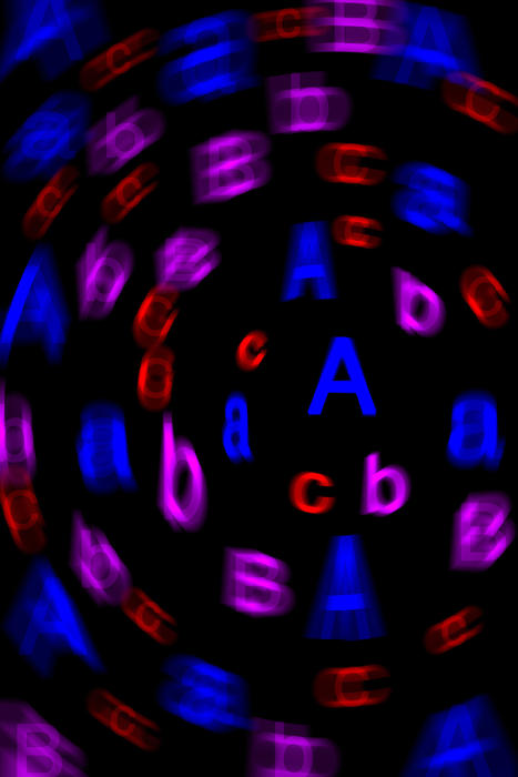 a spinning jumble of letters, concept of dyslexia and reading problems