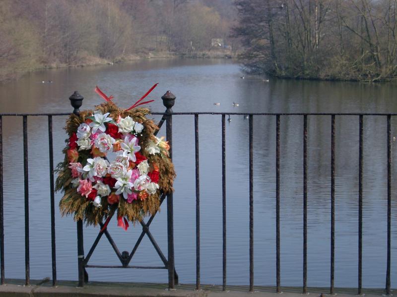 a floral wreath memorial