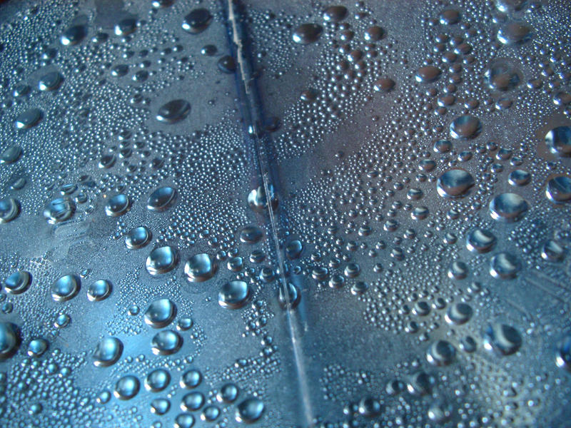 drops of condensation on a metalic surface