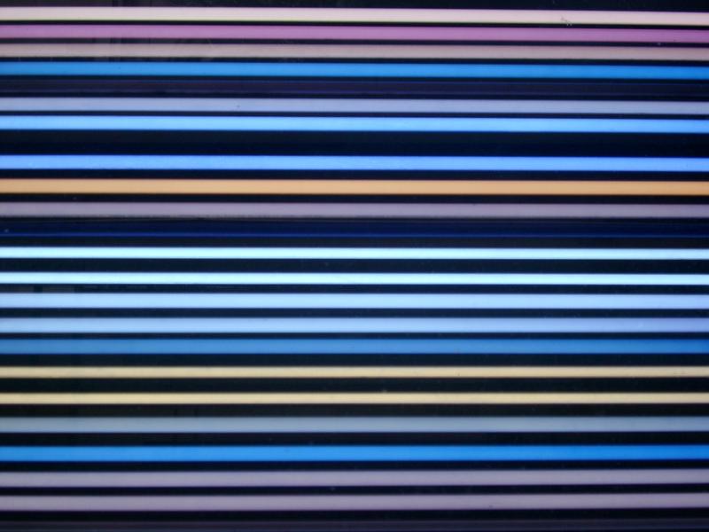 parallel glowing stripes in blue, white and cyan colours