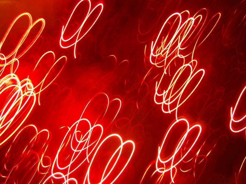 red glowing pattern of light resembling light bulb filaments