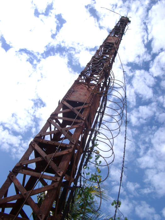 remains of a rusty old radio mast, punta allen, mexico