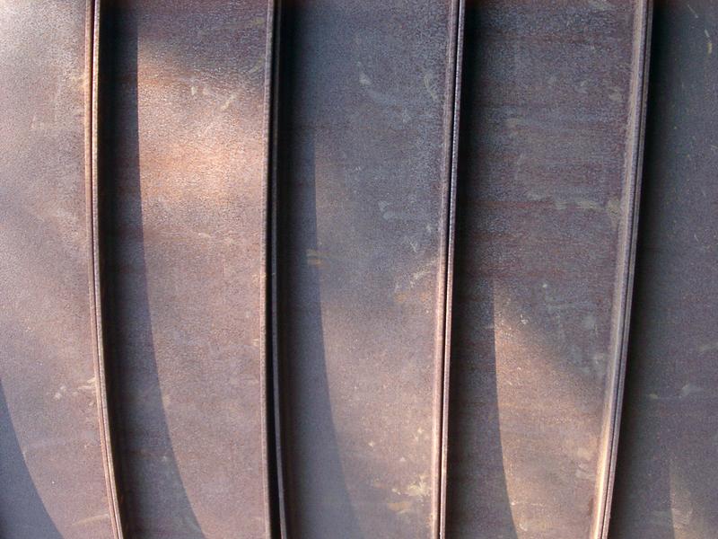 curved rusted metal slats