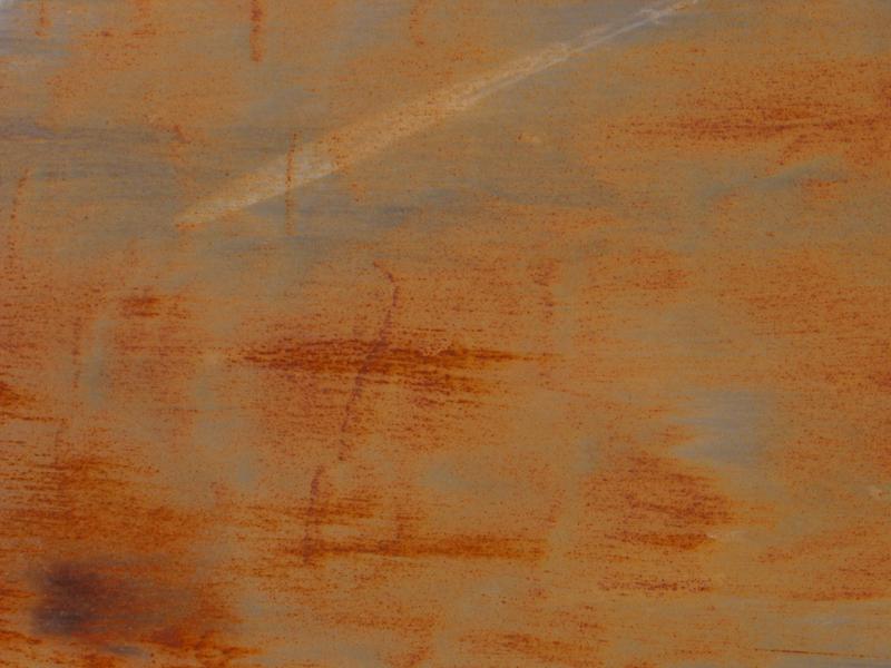 grunge structure of a scratched and rusty metal sheet