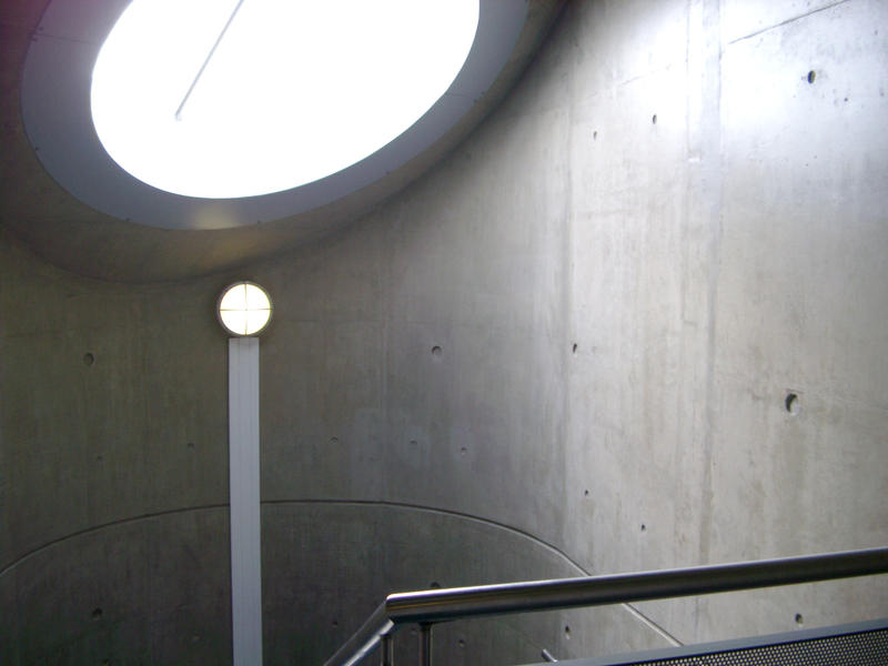 a large sky liight in a modern concrete building