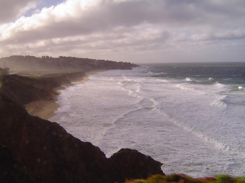 waves breaking on the california coast