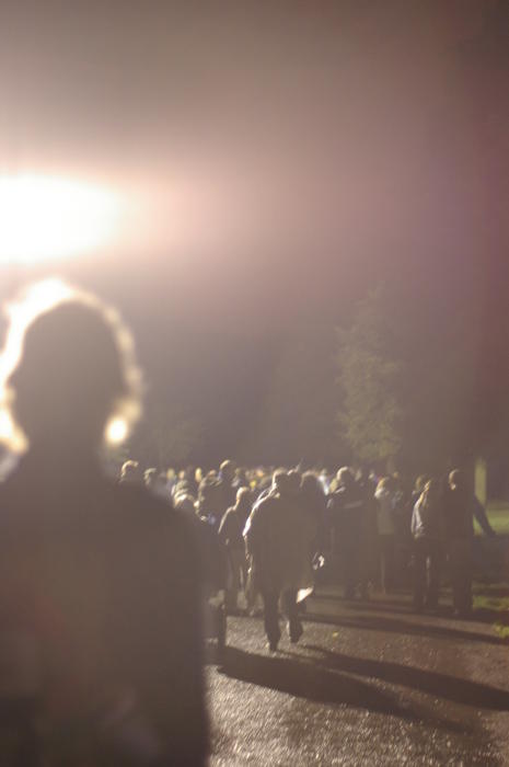 abstract photography, people walking towards a bright light