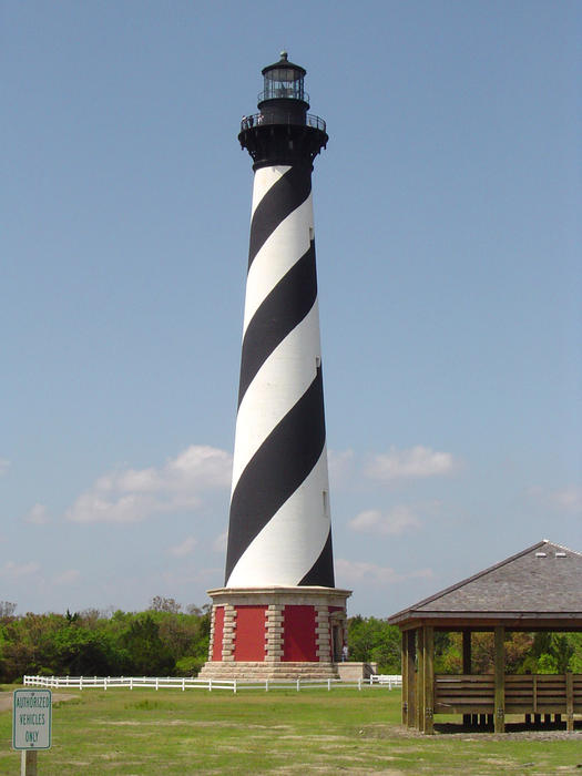 coastal landmark, a spiral striped lighthouse