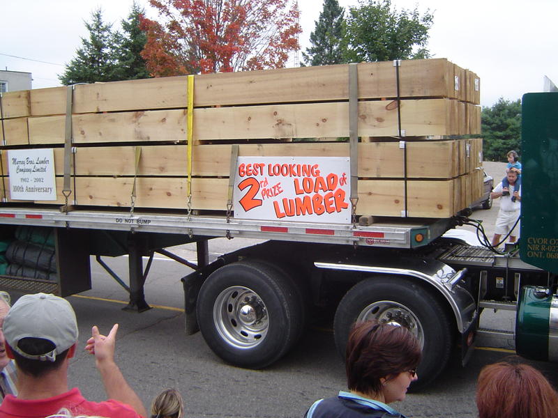 parade of logging trucks and forestry machinery, ontarion, canada