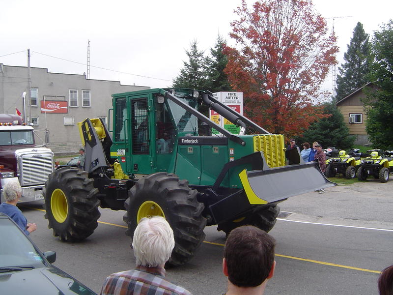 parade of logging trucks and forestry machinery, ontarion, canada