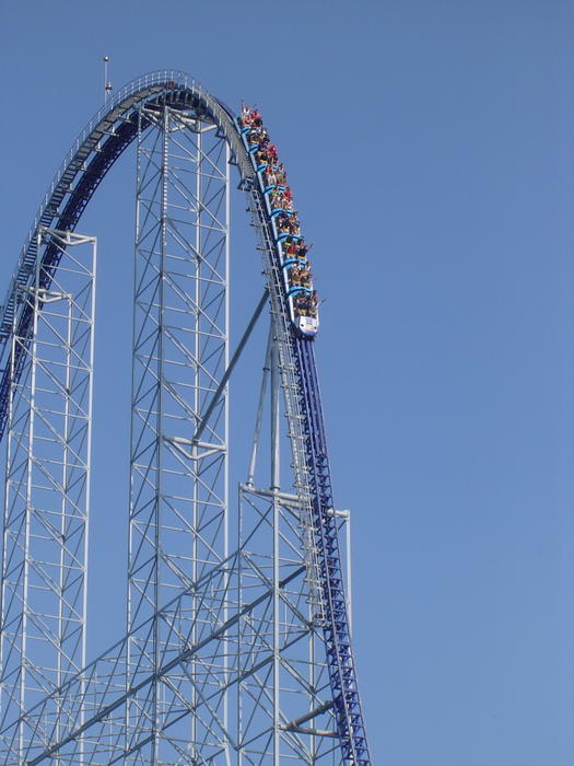 a metal frame rollercoaster and an american theme park - not model released