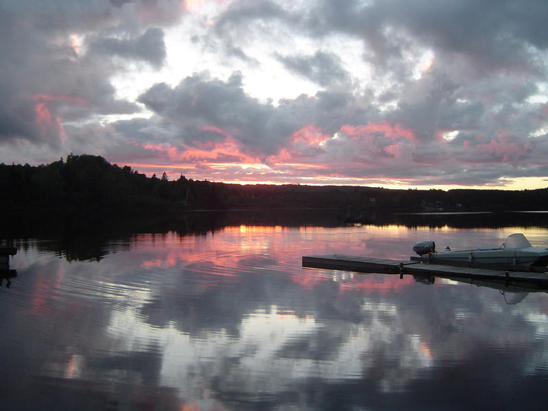 sunset over a lake in Algonquin provincial park, Ontario, Canada