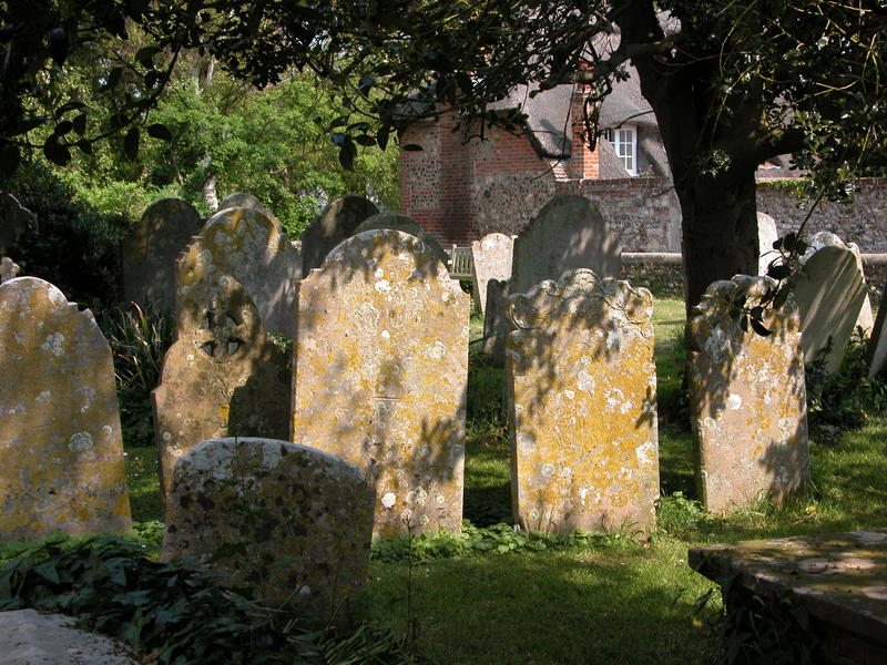 Gravestones in the churchyard at Bosham, West Sussex