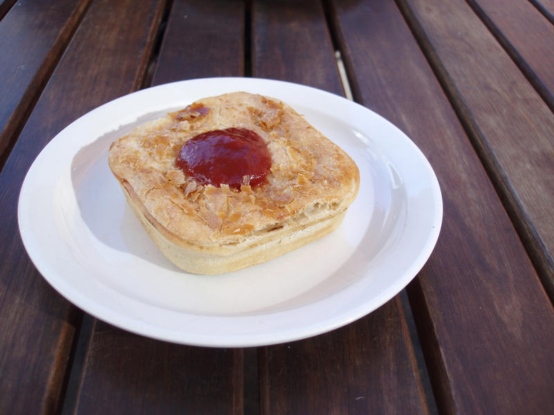 fine australian cuisine, the meat pie and tomato sauce is the iconic national dish