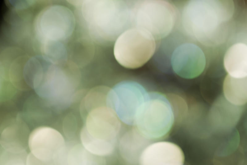 a dreamlike green bokeh background