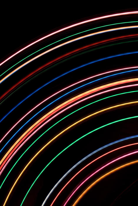 curved concentric lines of vivid coloured light