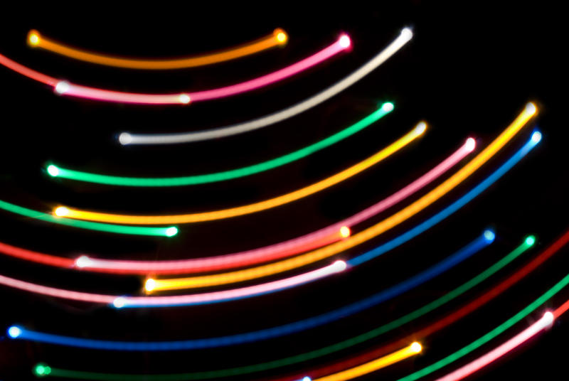 glowing lines forming concentric curved arcs