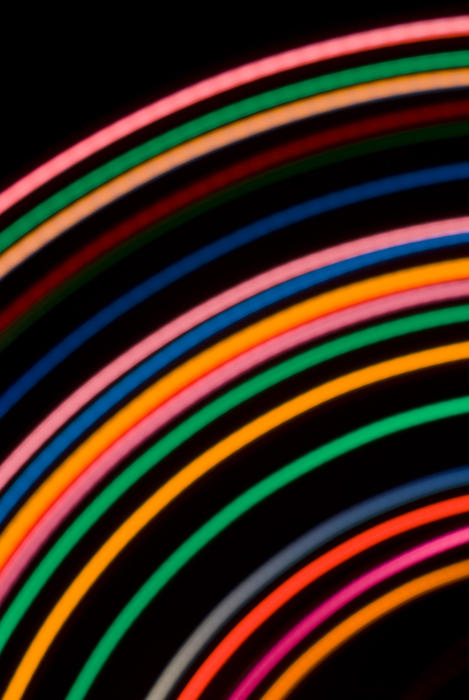 a neon style backdrop of arcs from concentric circles