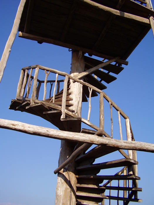 A wooden spiral stair case, sian kaan visitor center