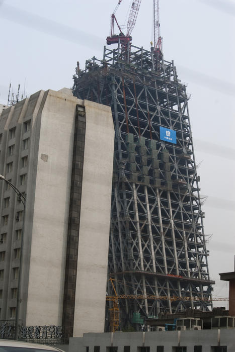 construction of the China Central Television Headquarters distinctive leaning towers