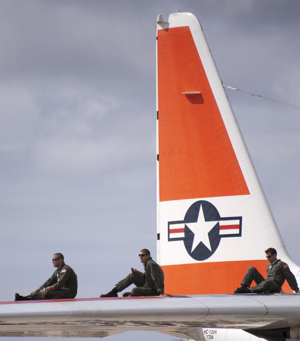 editorial use only : watching an airshow from the tailplane of a coastguard Hercules aircraft