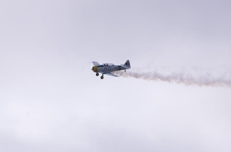 A T-6A navy training aircraft in the sky