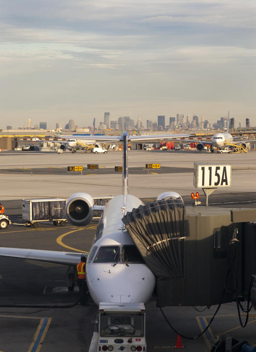 editorial use only : a passenger jet at a city airport terminal