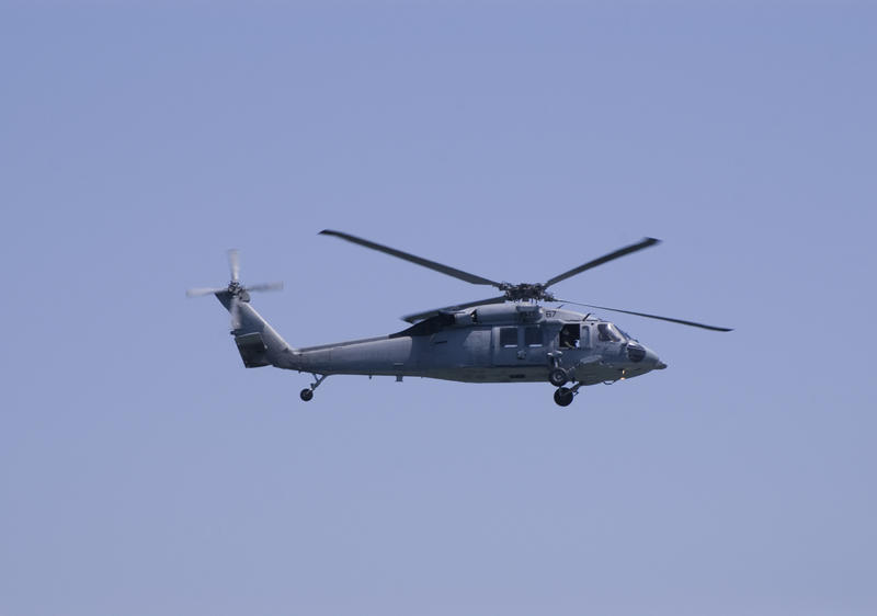 A Sikorsky SH-60 Seahawk (similar to a UH-60 Black Hawk) in the sky
