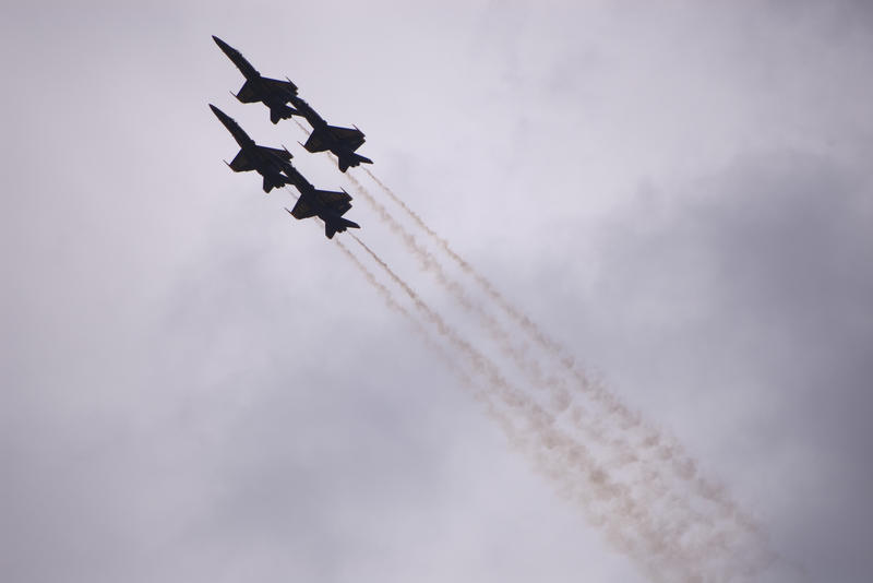 US navy blue angles flying in formation with smoke trails