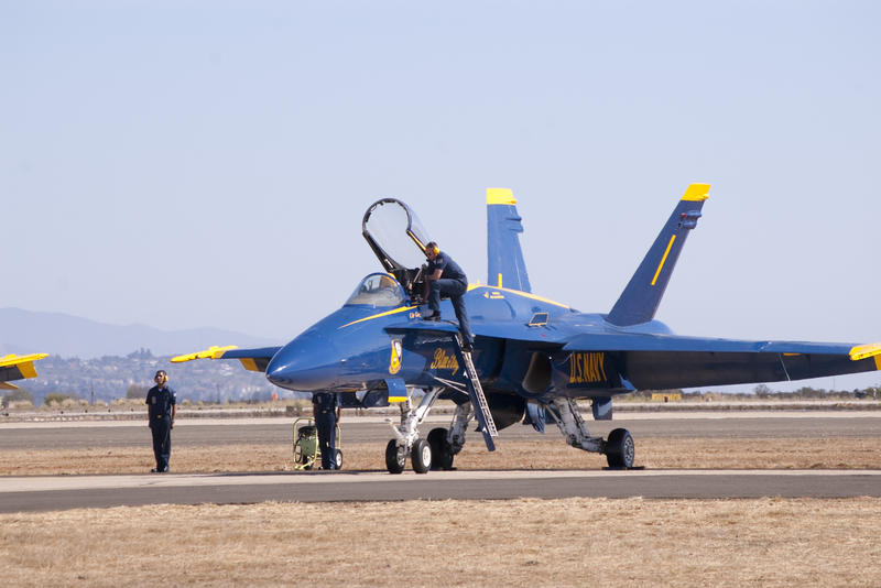a blue angels hornet on the ground ready for an air show display