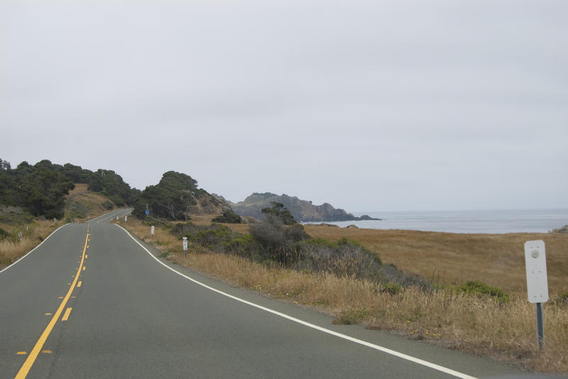 the view from a drive along a scenic coastal highway