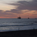 2553-oil rigs and tanker at sunset