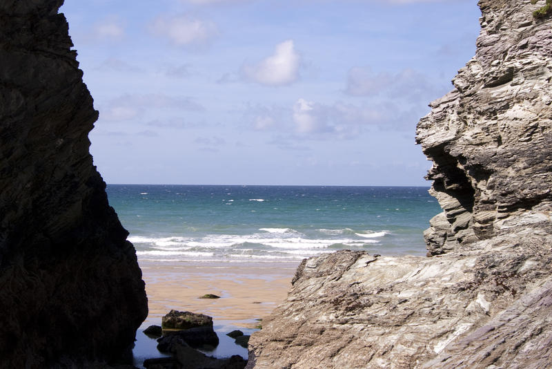 looking out to sea from a seculded cove on a beach near newquay