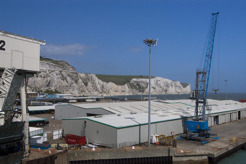 a view of the white cliffs of dover from a ferry terminal