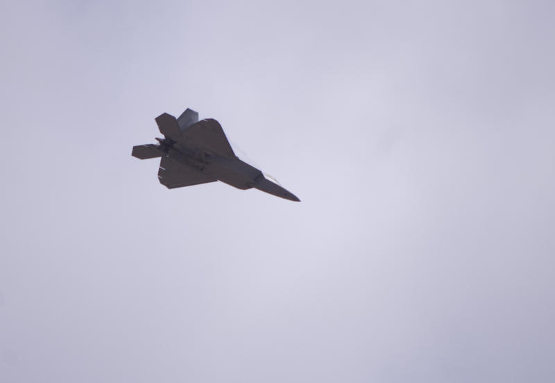 Underside of a F-22 Raptor Stealth Fighter in flight as viewed from the ground