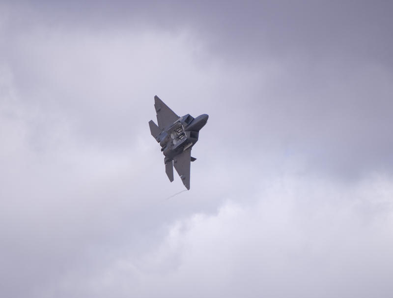 Lockheed Martin F-22 Raptor with it's weapons bay doors open revealing centre and two smaller side weapons bays, weapons are hidden inside bays in the aircraft to maintain stealth