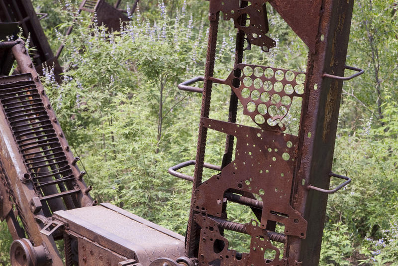 close up on the a rusted metal work of a modern art sculpture