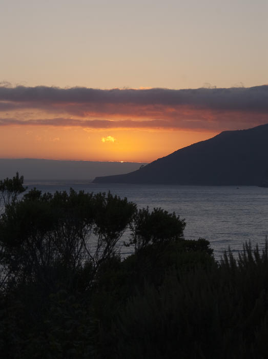 sunset over california's big sur coastline