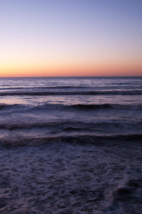 a colourful ocean view after sunset