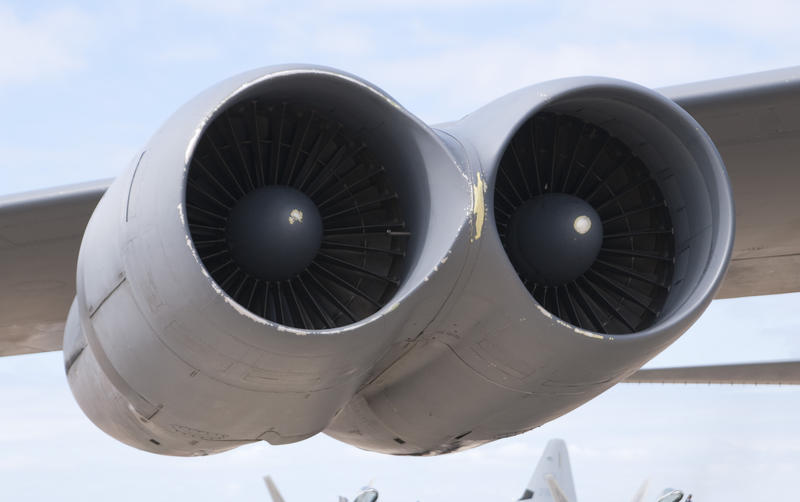 a twin jet engine mounted under an aircraft wing