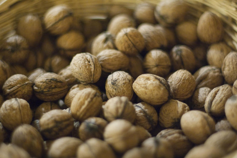 a bowl of wallnuts pictured with a narrow depth of field