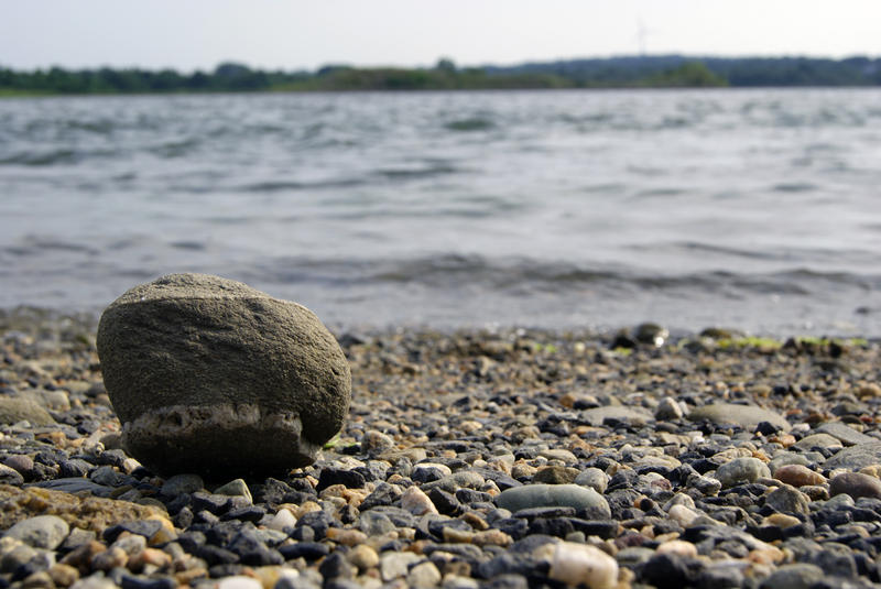 <p>Rock On Beach</p>Unique rock sits on the beach