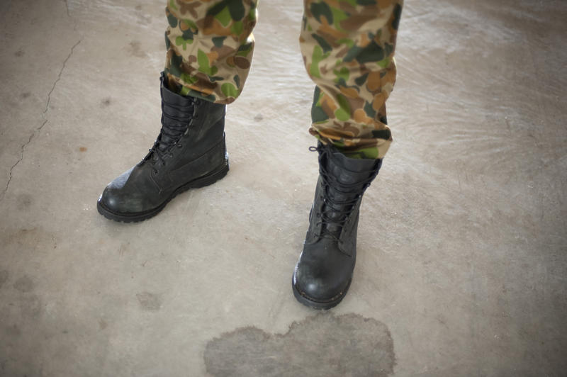 army combat boots and camouflage pants